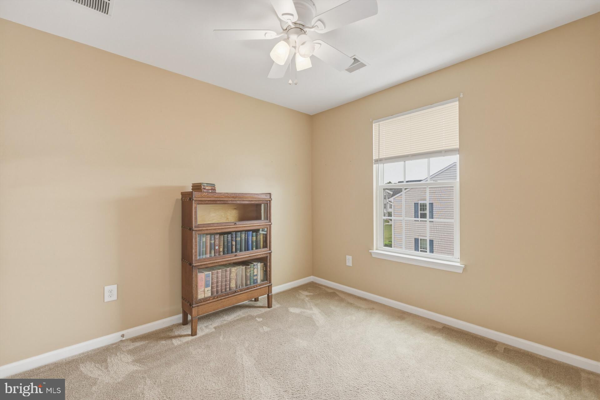 325 Schmidt Road Phoenixville, PA 19460 - Photo 21 of 27 an empty room with windows and cabinet