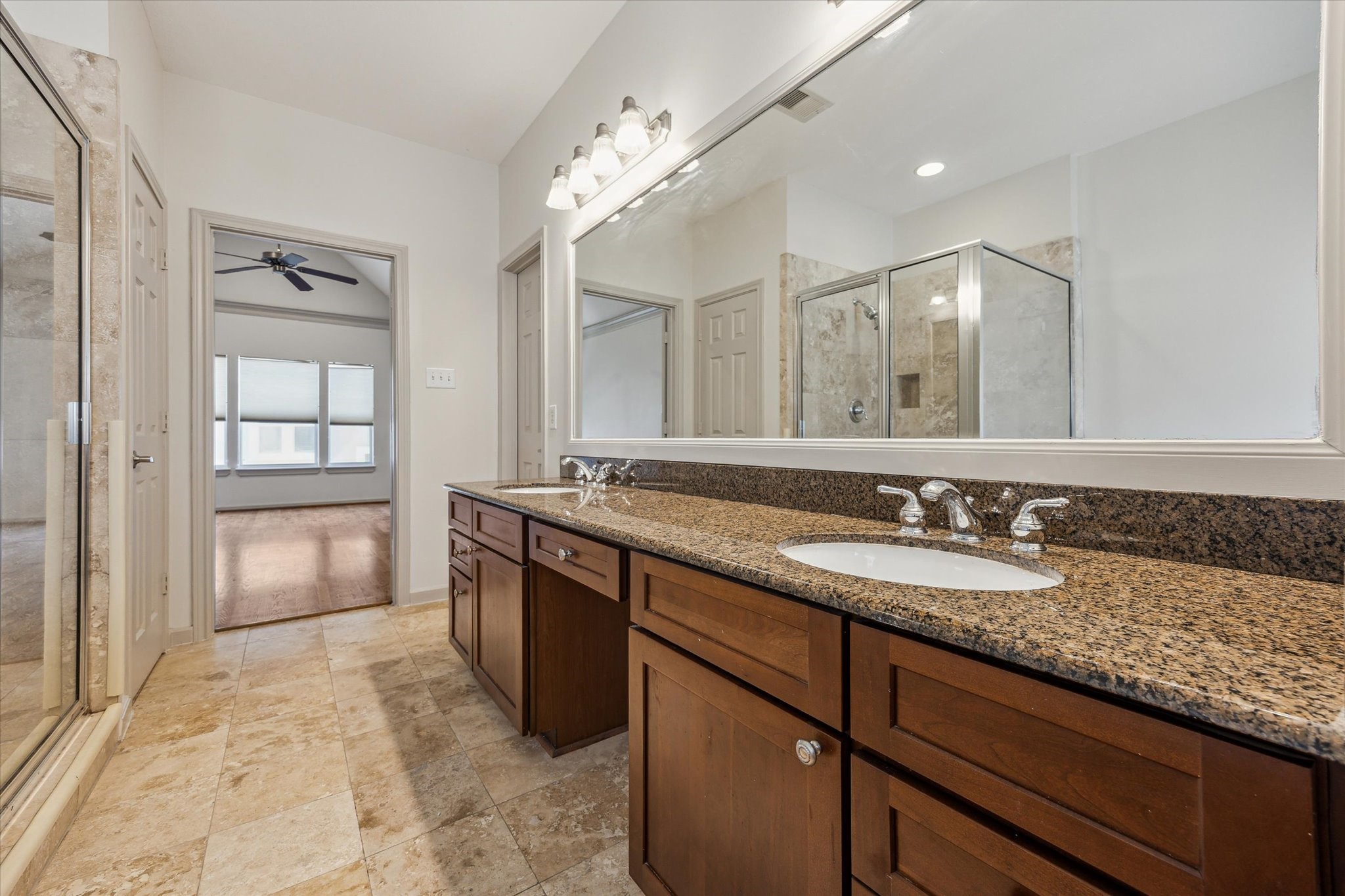 5334 Kiam Street, Unit C Houston, TX 77007 - Photo 15 of 23 a bathroom with a granite countertop sink and a mirror