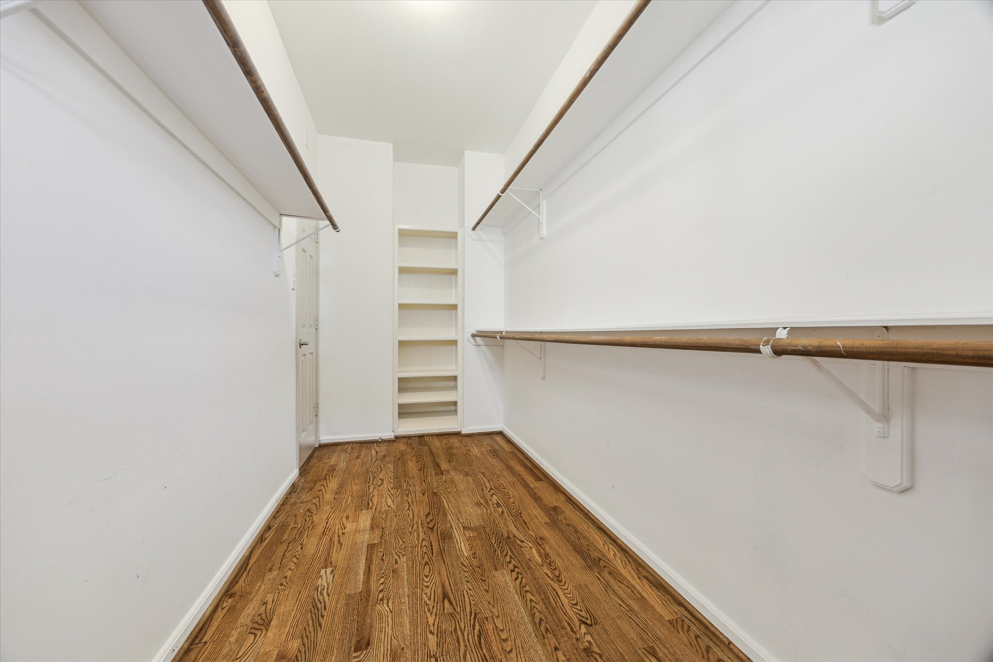 5334 Kiam Street, Unit C Houston, TX 77007 - Photo 17 of 23 a view of a room with racks on the wall