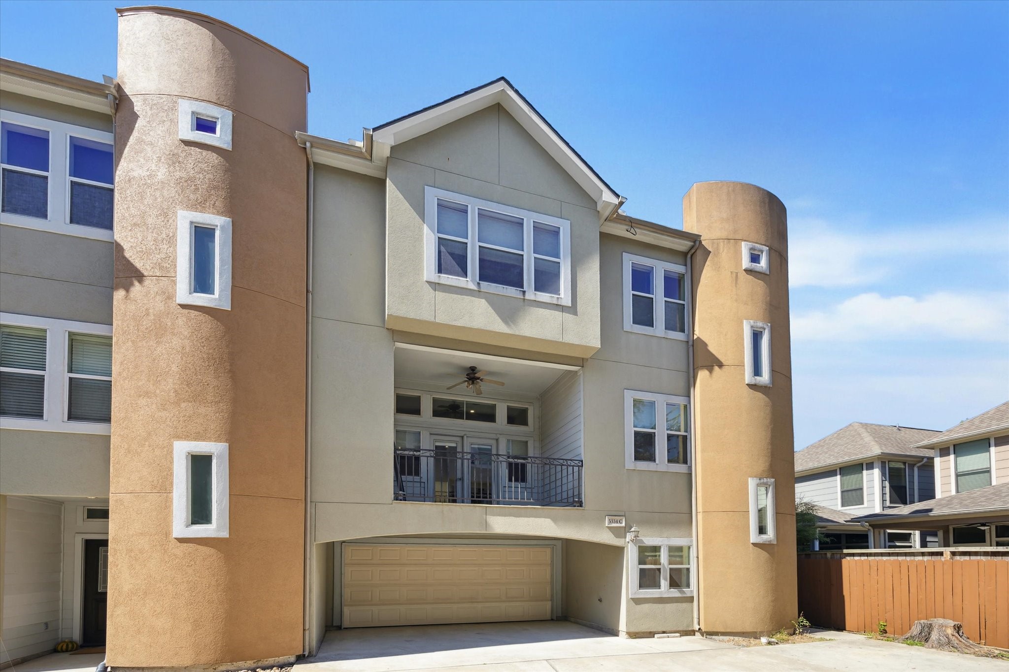 5334 Kiam Street, Unit C Houston, TX 77007 - Photo 2 of 23 a front view of a house with a yard