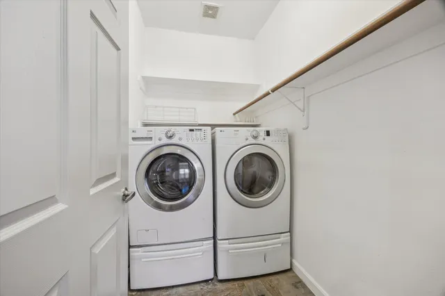a utility room with dryer and washer