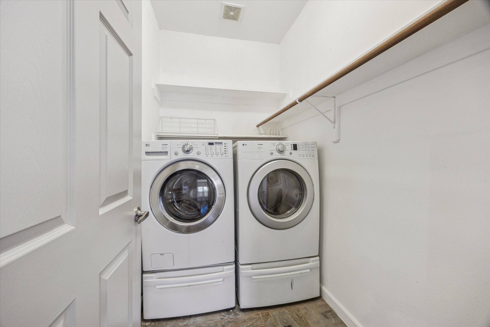 5334 Kiam Street, Unit C Houston, TX 77007 - Photo 21 of 23 a utility room with dryer and washer