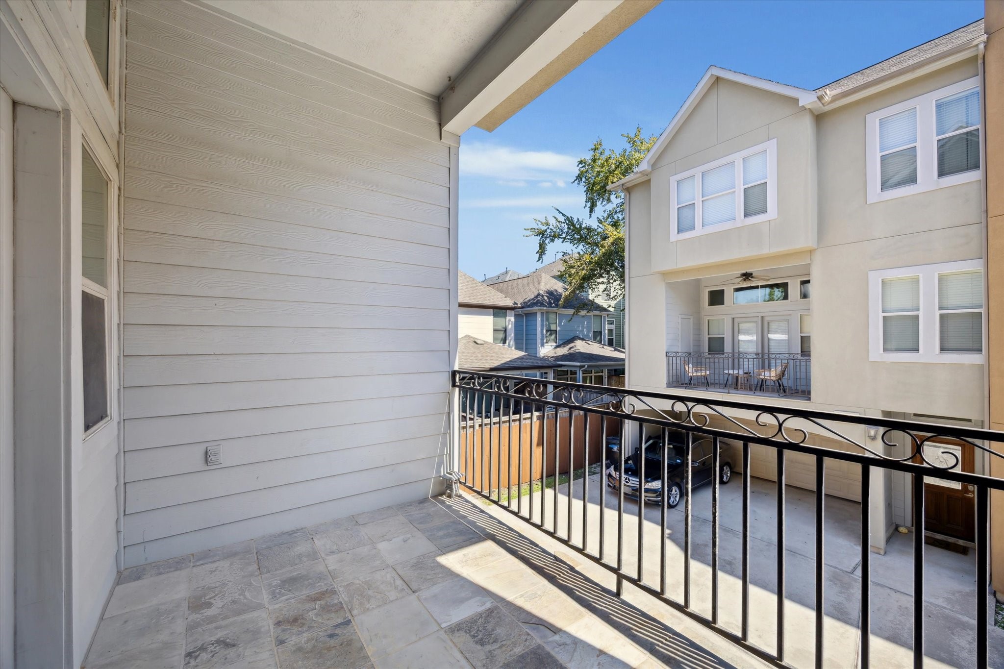 5334 Kiam Street, Unit C Houston, TX 77007 - Photo 22 of 23 a view of a balcony with a potted plant and stairs