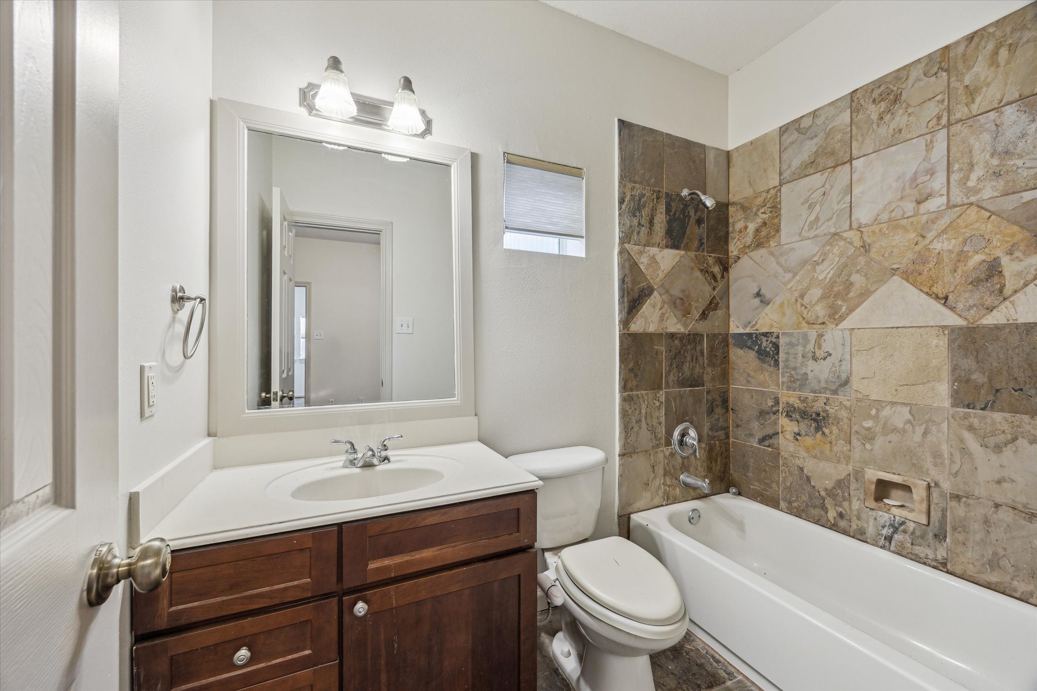 5334 Kiam Street, Unit C Houston, TX 77007 - Photo 6 of 23 a bathroom with a sink toilet and shower
