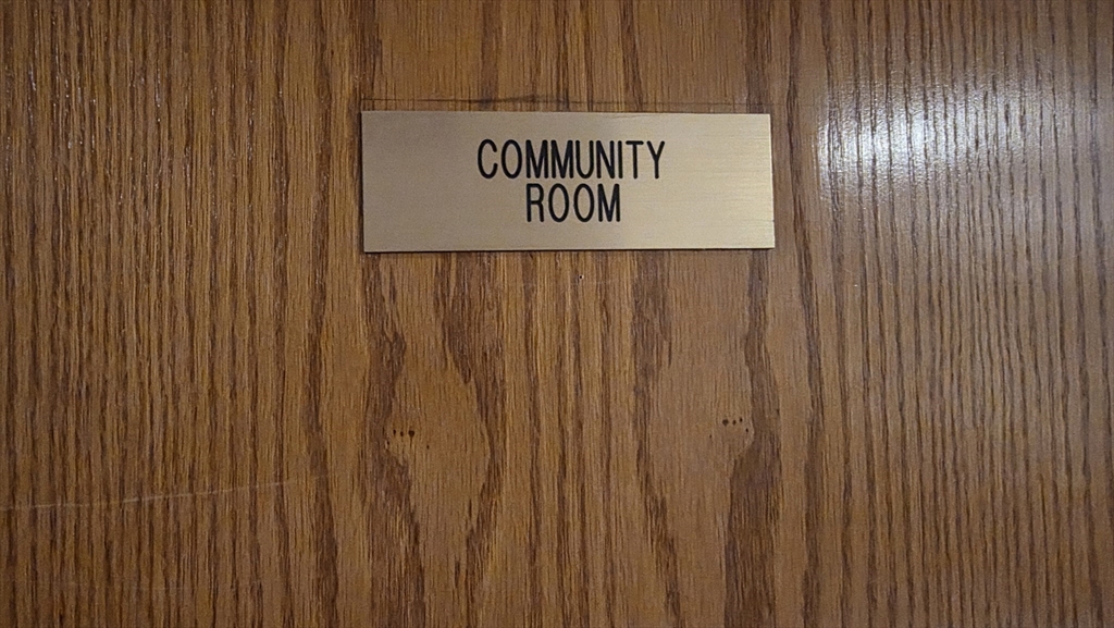 200 Burkhall Street, Unit 102 Weymouth, MA 02190 - Photo 17 of 25 a sign that is on a wooden wall