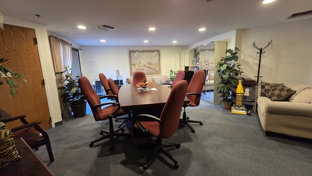 200 Burkhall Street, Unit 102 Weymouth, MA 02190 - Photo 18 of 25 a view of a dining room with furniture