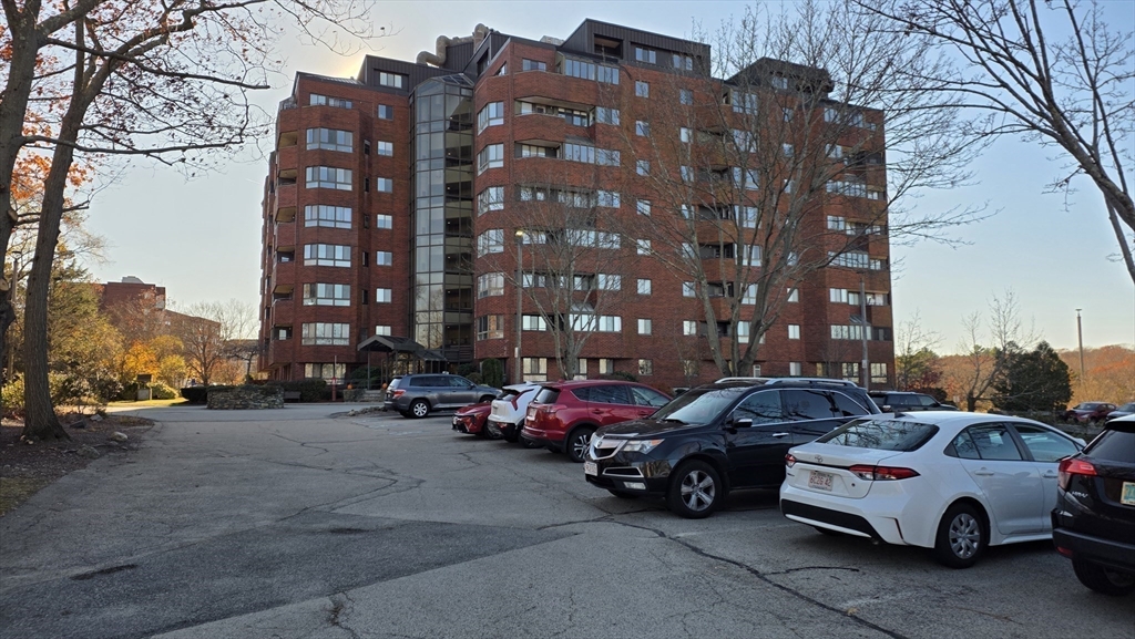 200 Burkhall Street, Unit 102 Weymouth, MA 02190 - Photo 23 of 25 a car parked in front of a building