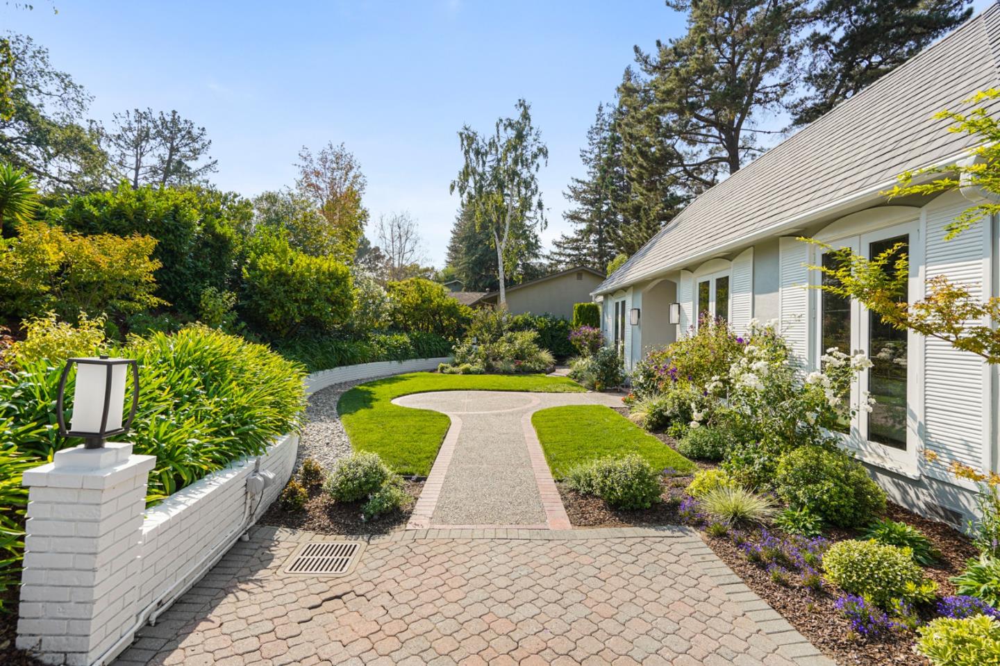 2312 Crest Lane Menlo Park, CA 94025 - Photo 3 of 34 a view of house with garden and entertaining space