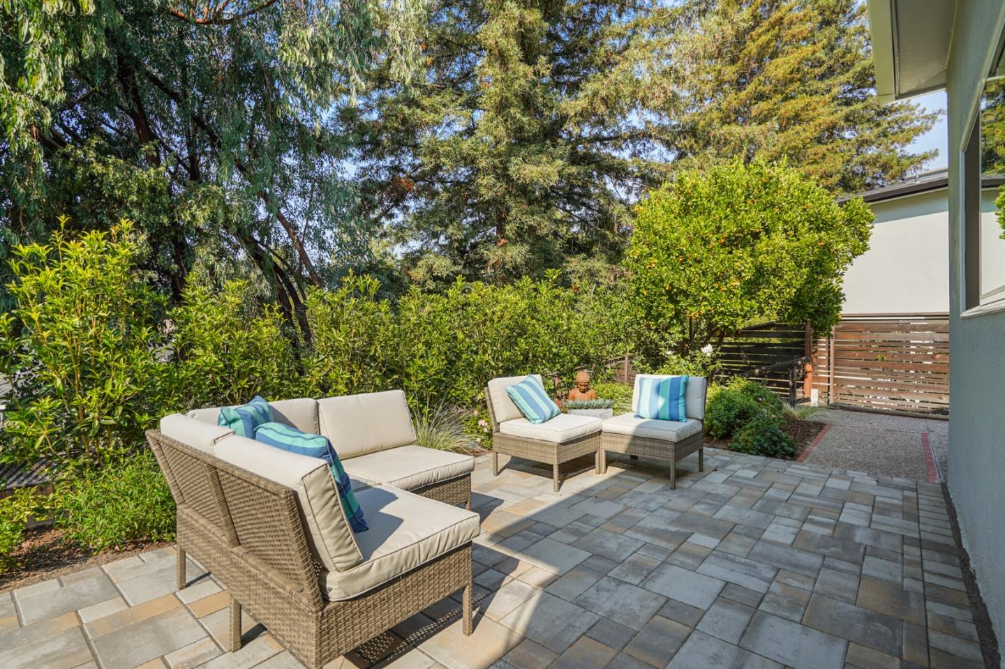 2312 Crest Lane Menlo Park, CA 94025 - Photo 23 of 34 a backyard of a house with table and chairs