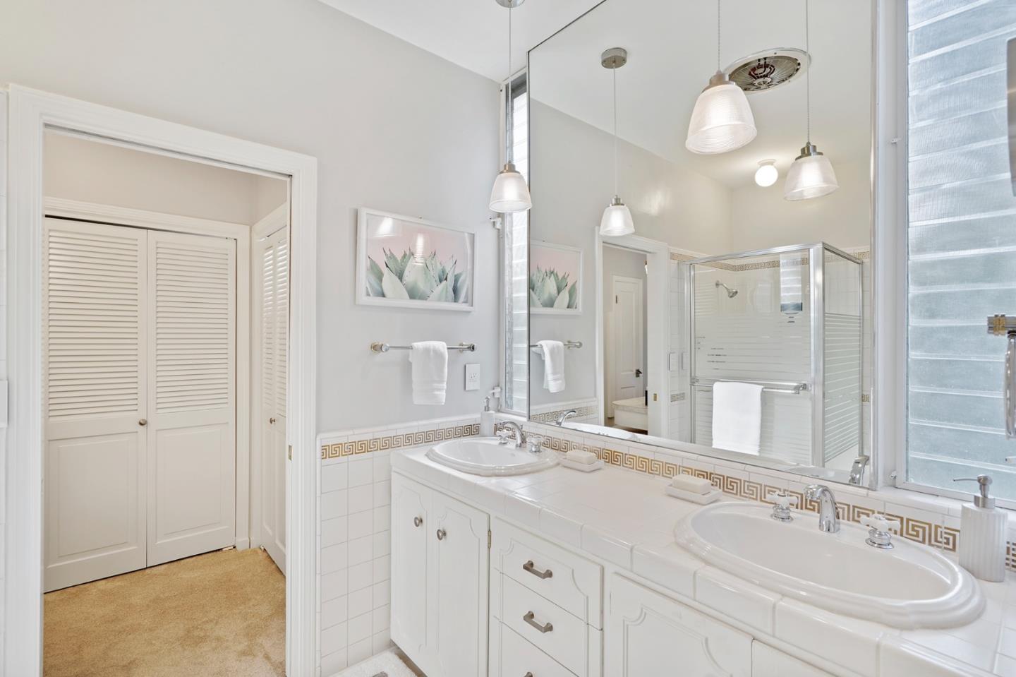 2312 Crest Lane Menlo Park, CA 94025 - Photo 25 of 34 a bathroom with a sink double vanity and a mirror