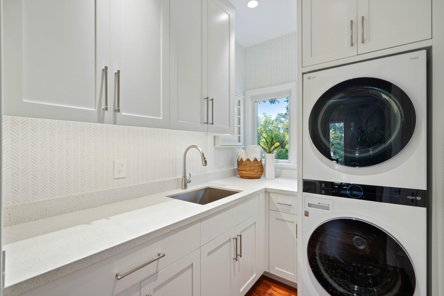 2312 Crest Lane Menlo Park, CA 94025 - Photo 26 of 34 a kitchen with a sink and a washer dryer