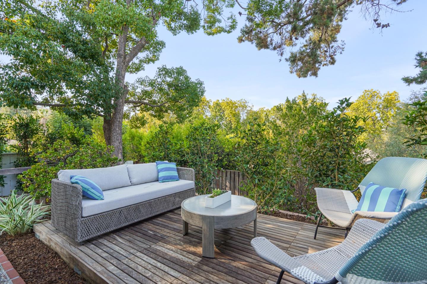 2312 Crest Lane Menlo Park, CA 94025 - Photo 27 of 34 a view of a patio with couches table and chairs and potted plants