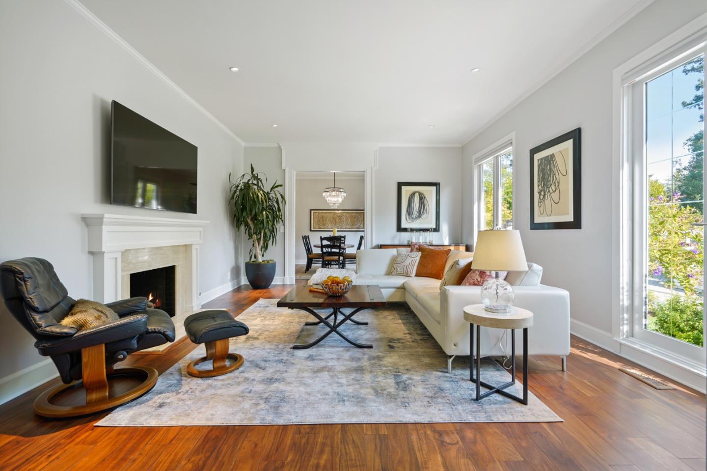2312 Crest Lane Menlo Park, CA 94025 - Photo 10 of 34 a living room with furniture fireplace and a flat screen tv