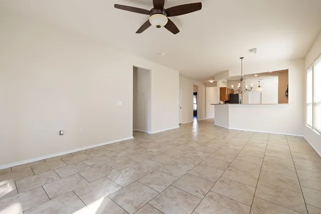 a view of a kitchen with a sink and cabinets