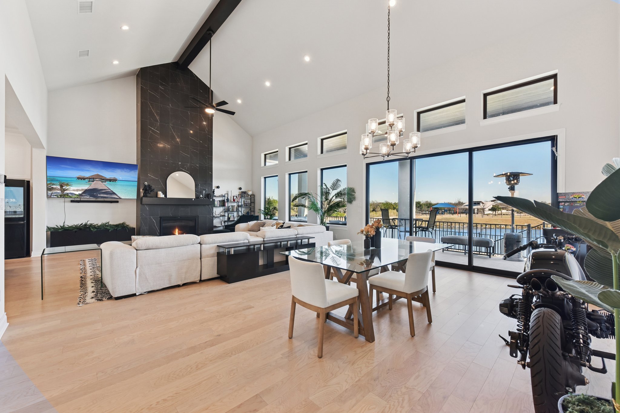 222 Rio Ranchero Road Georgetown, TX 78628 - Photo 11 of 40 a living room with fireplace furniture and a large window