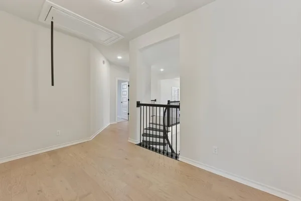 a view of a hallway with entryway