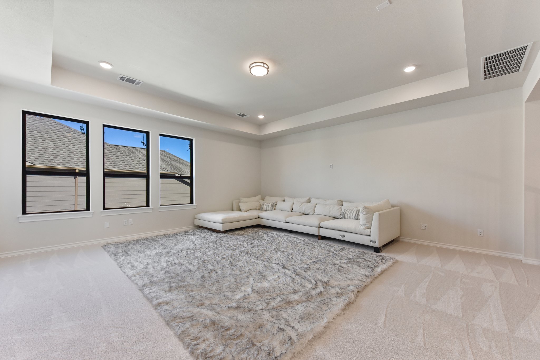 222 Rio Ranchero Road Georgetown, TX 78628 - Photo 19 of 40 a living room with furniture and large window