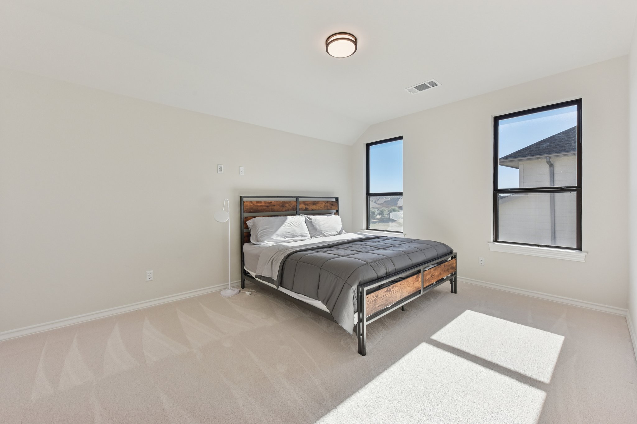 222 Rio Ranchero Road Georgetown, TX 78628 - Photo 23 of 40 a bedroom with a bed and window