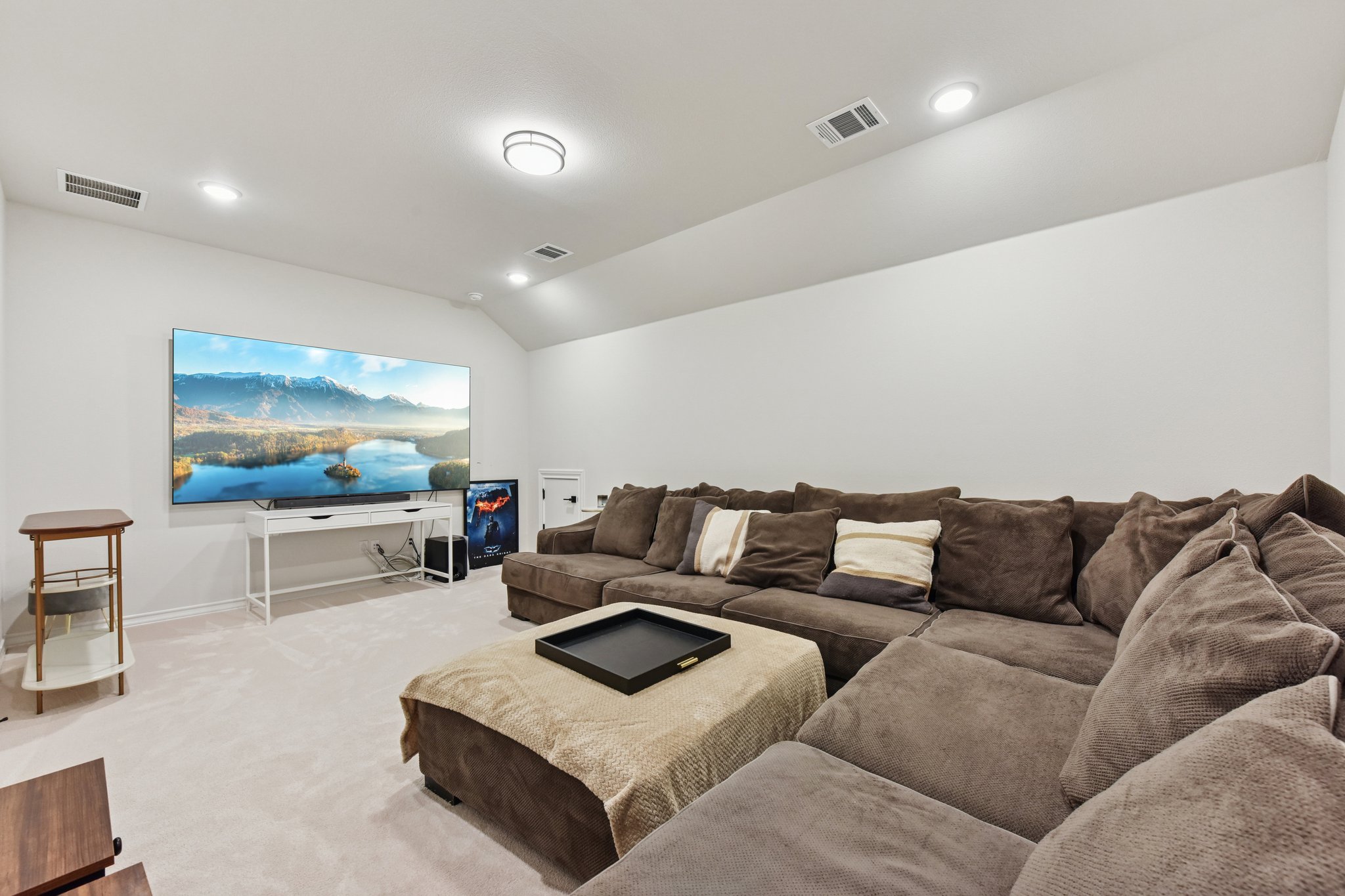 222 Rio Ranchero Road Georgetown, TX 78628 - Photo 31 of 40 a living room with furniture and a flat screen tv