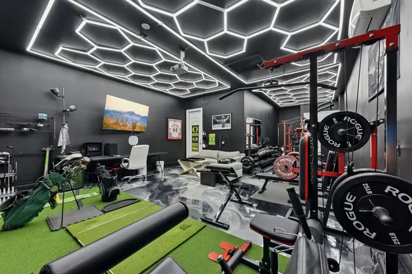 a living room with lots of furniture and a flat screen tv