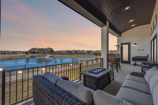 a picture of a bathroom with a white wall