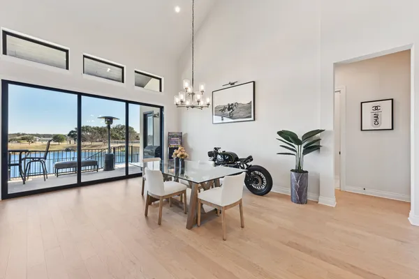 a view of a livingroom with furniture and hardwood floor