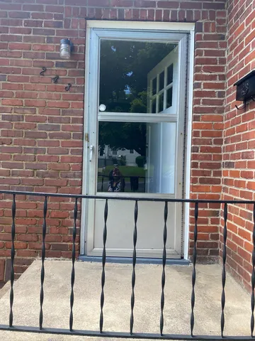 a view of a door with a balcony