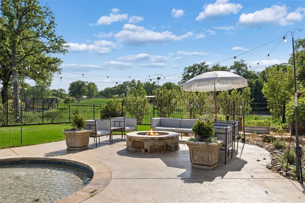 12630 Merrill Road Pilot Point, TX 76258 - Photo 17 of 39 Firepit perfect for quiet evenings.