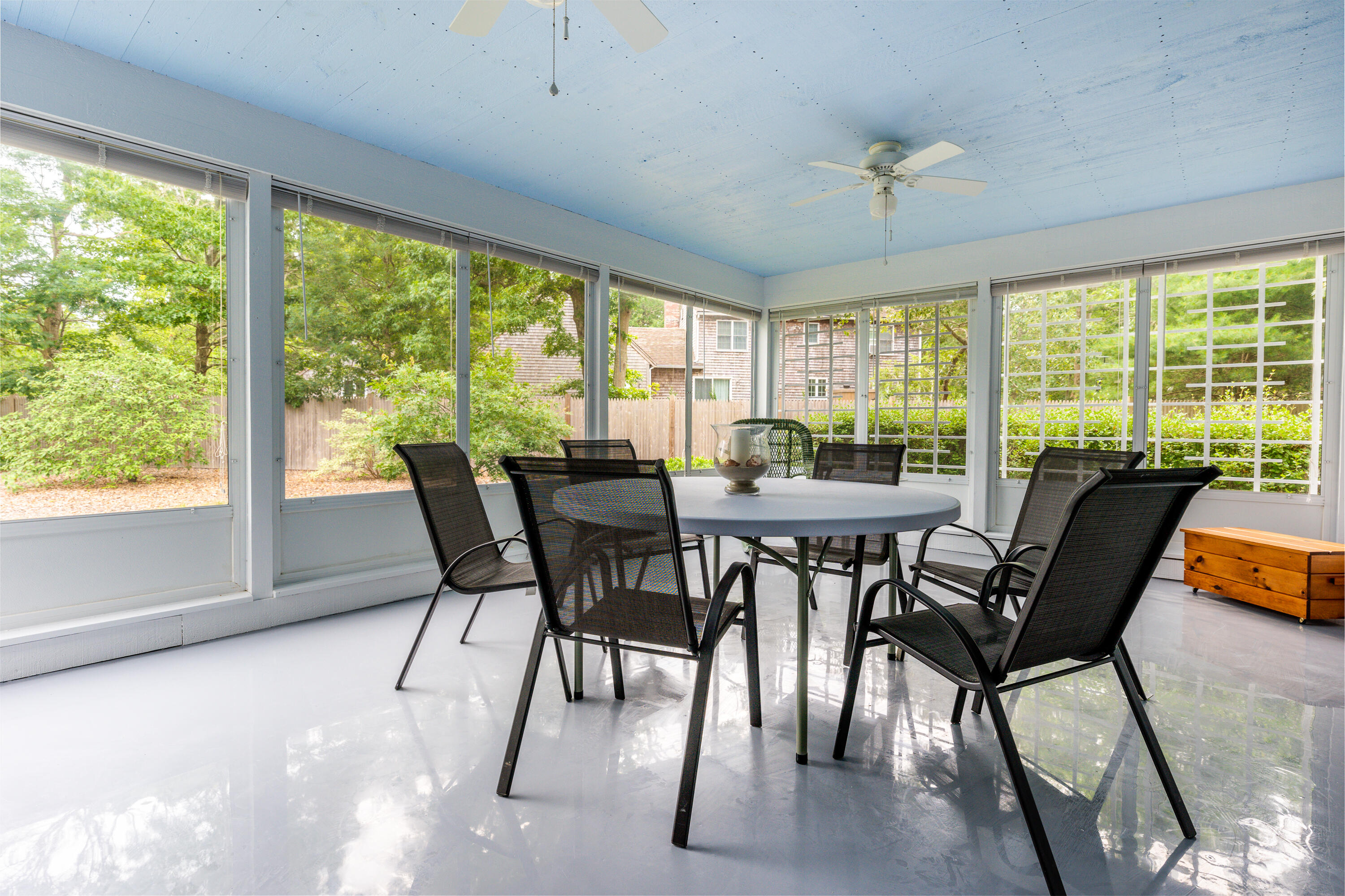 4 Leaf Lane Eastham, MA 02642 - Photo 20 of 39 a view of a dining room with furniture window and outside view