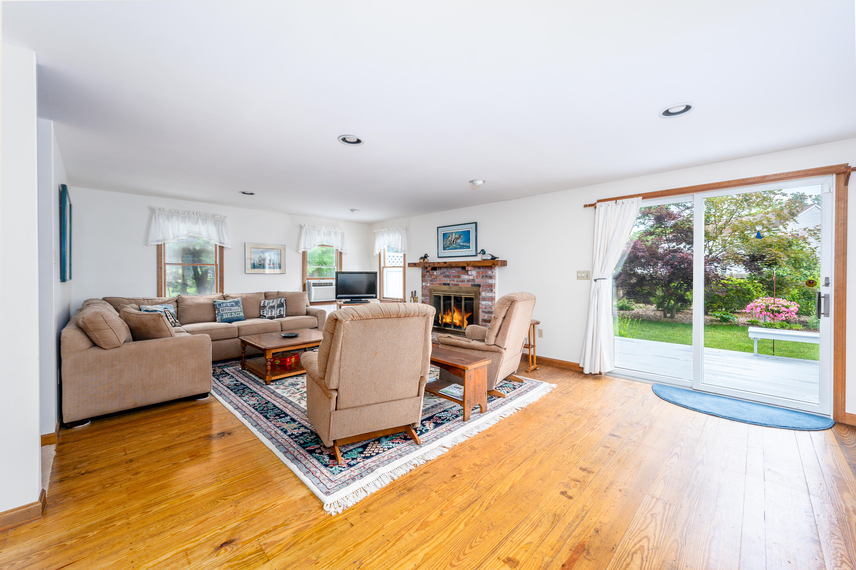 4 Leaf Lane Eastham, MA 02642 - Photo 24 of 39 a living room with furniture floor to ceiling window and floor to ceiling window