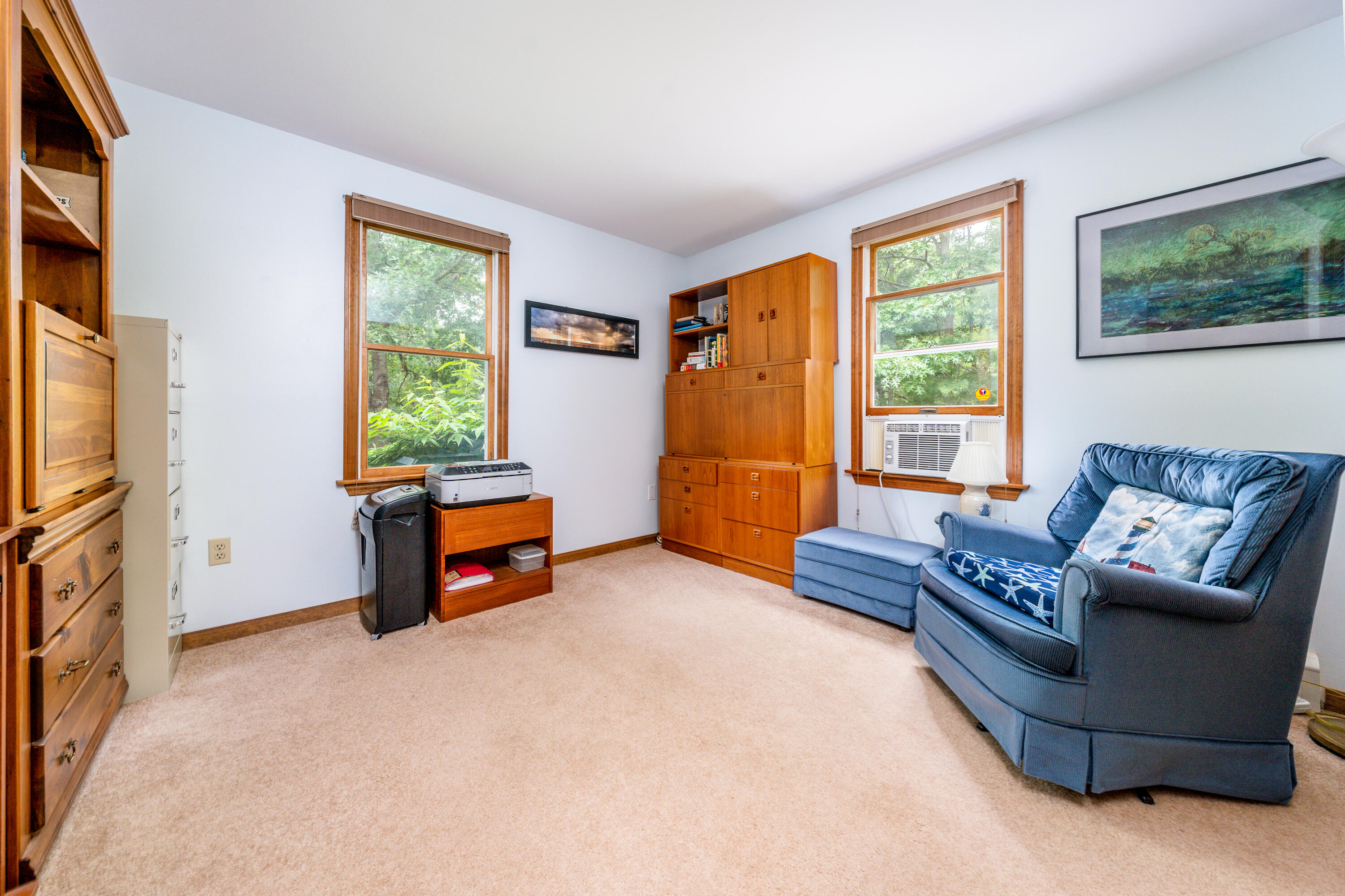 4 Leaf Lane Eastham, MA 02642 - Photo 29 of 39 a living room with furniture and a flat screen tv