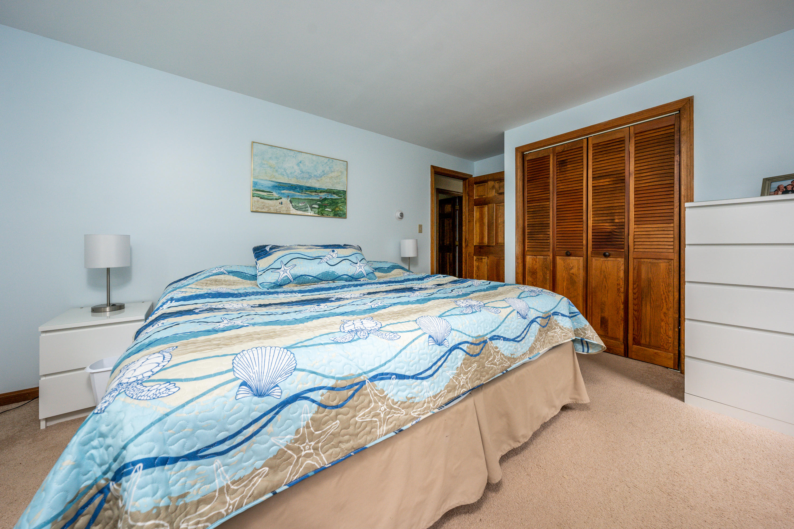 4 Leaf Lane Eastham, MA 02642 - Photo 33 of 39 a bedroom with a bed and a window