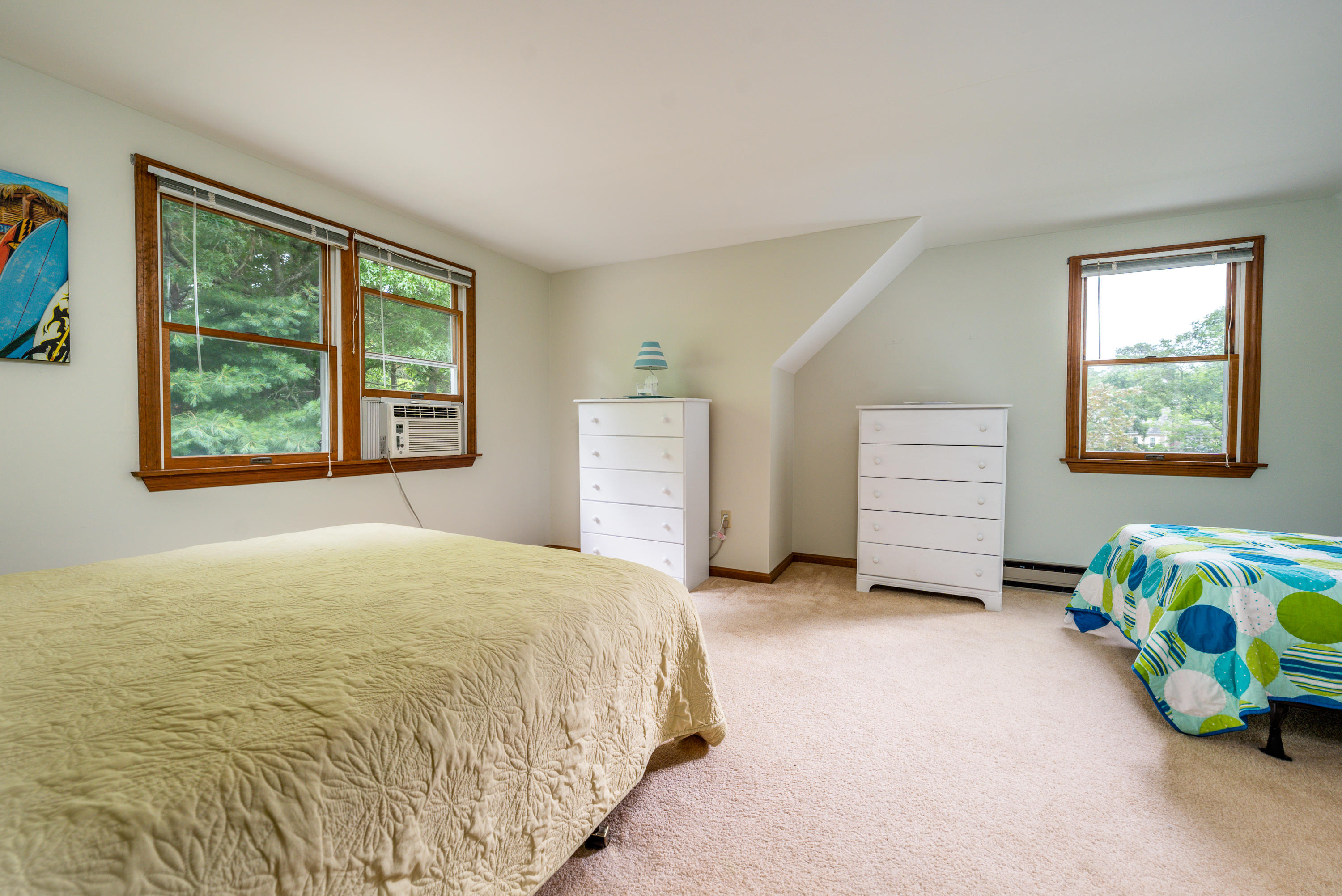4 Leaf Lane Eastham, MA 02642 - Photo 35 of 39 a bedroom with a bed and a window