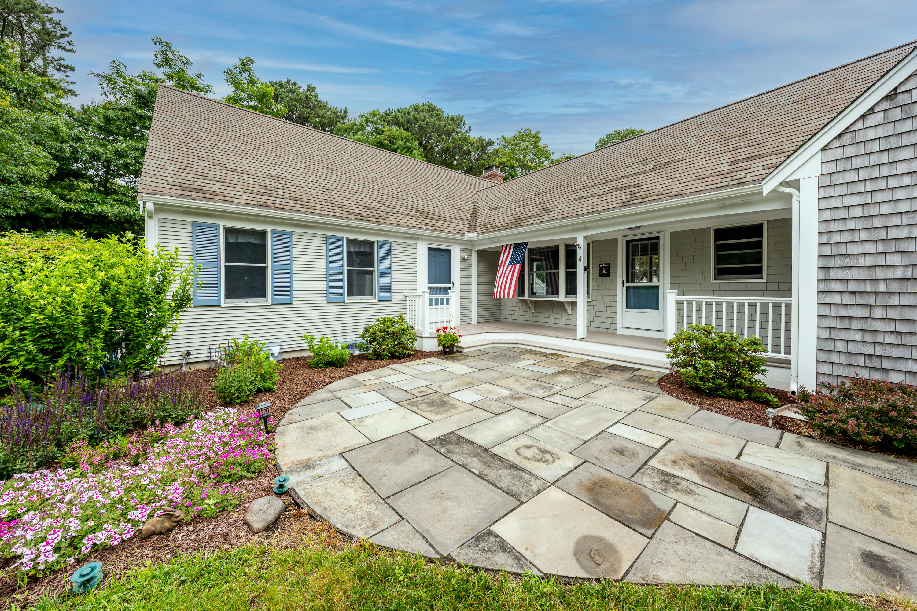 4 Leaf Lane Eastham, MA 02642 - Photo 4 of 39 a view of a house with a patio