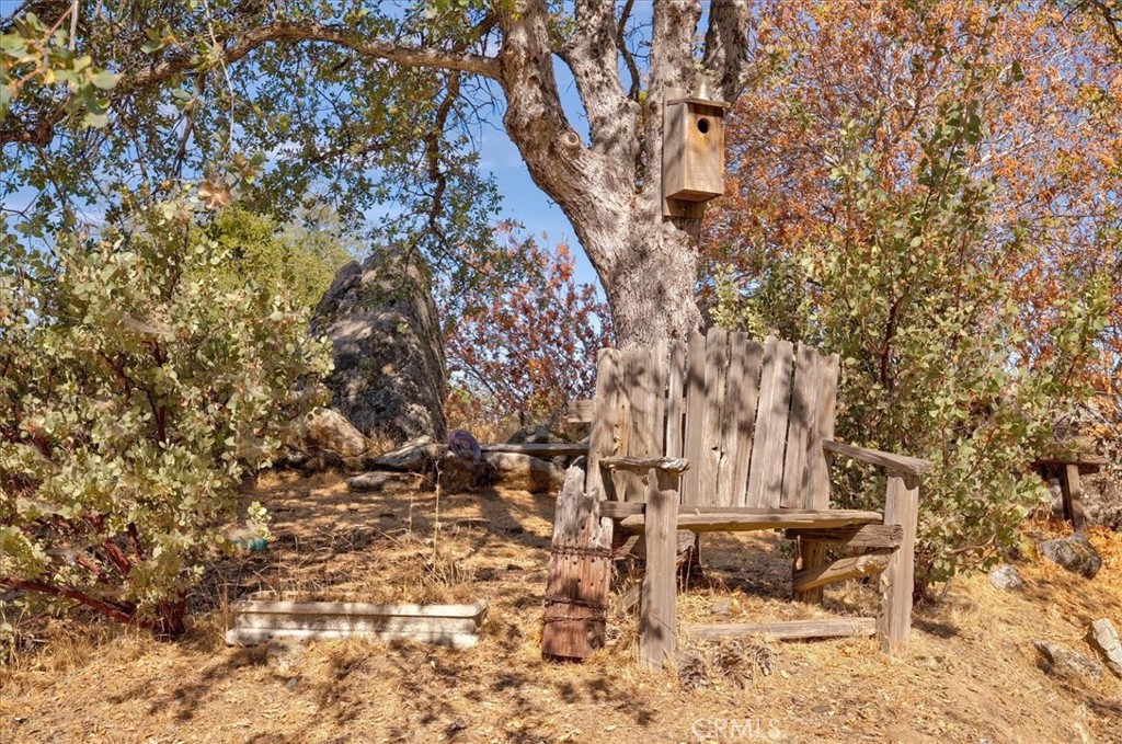 3279 Quail Run Road Mariposa, CA 95338 - Photo 22 of 41 a view of house with yard and sitting area