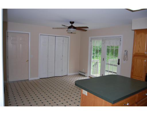 112 Greenwich Road Ware, MA 01082 - Photo 3 of 6 a view of a room that has a window in it