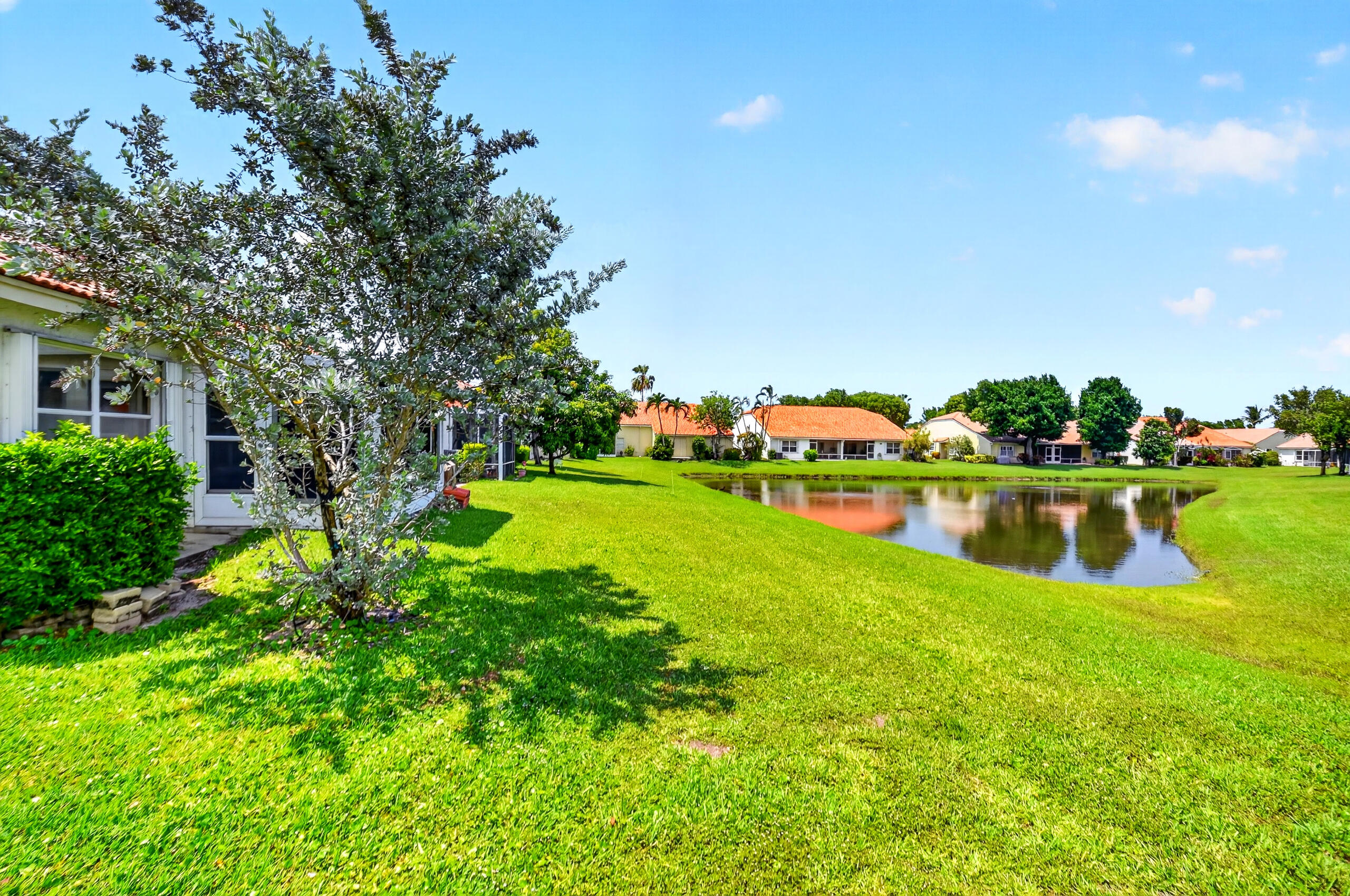 15340 Floral Club Road Delray Beach, FL 33484 - Photo 35 of 42 a view of a garden with houses