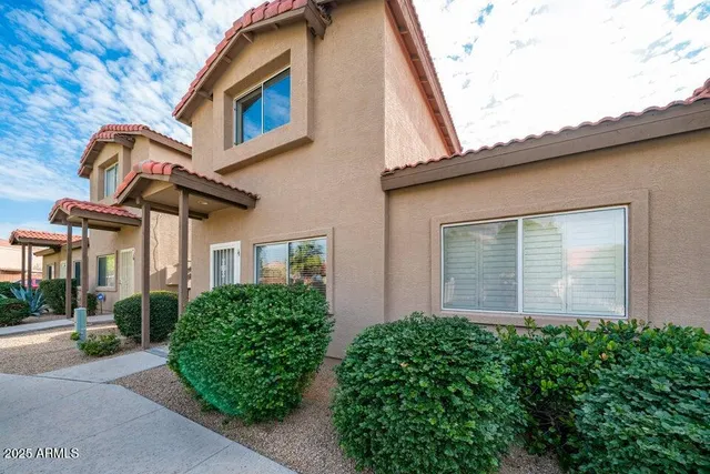 a view of a house with a garage