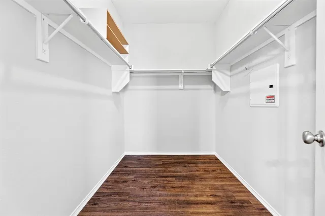 a view of a room with racks on the wall