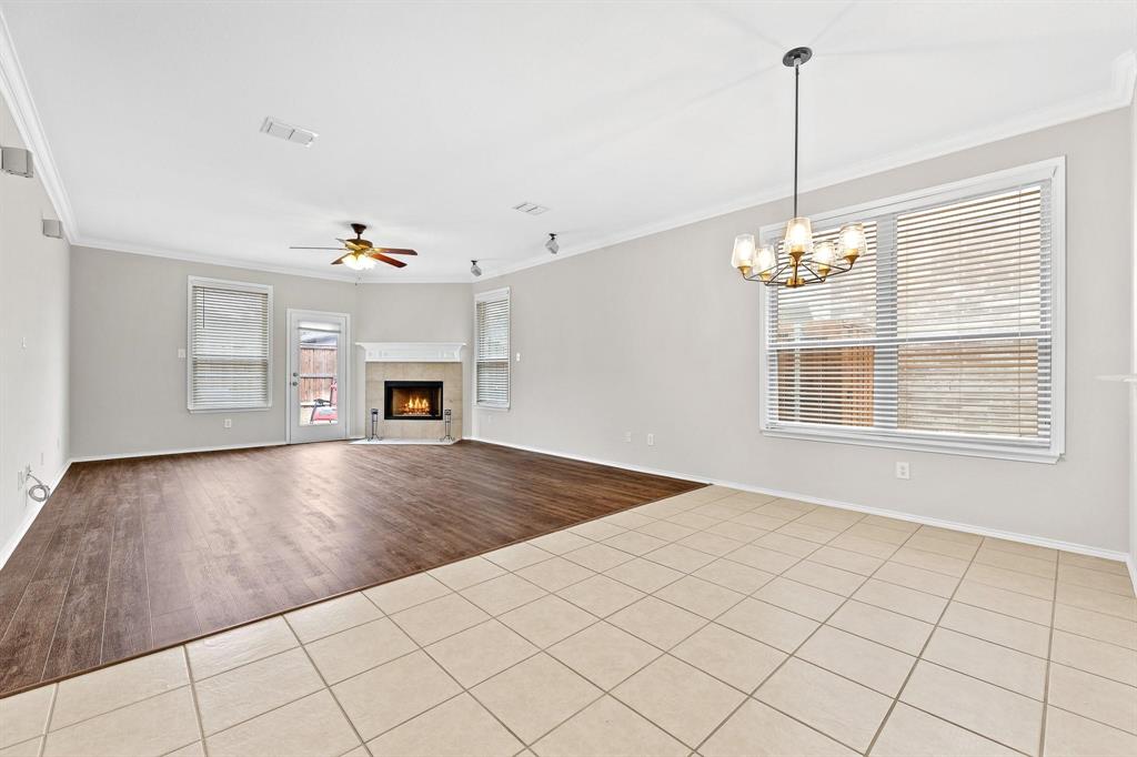 5812 Pebble Ridge Drive McKinney, TX 75070 - Photo 21 of 29 a view of an empty room with a window and kitchen view