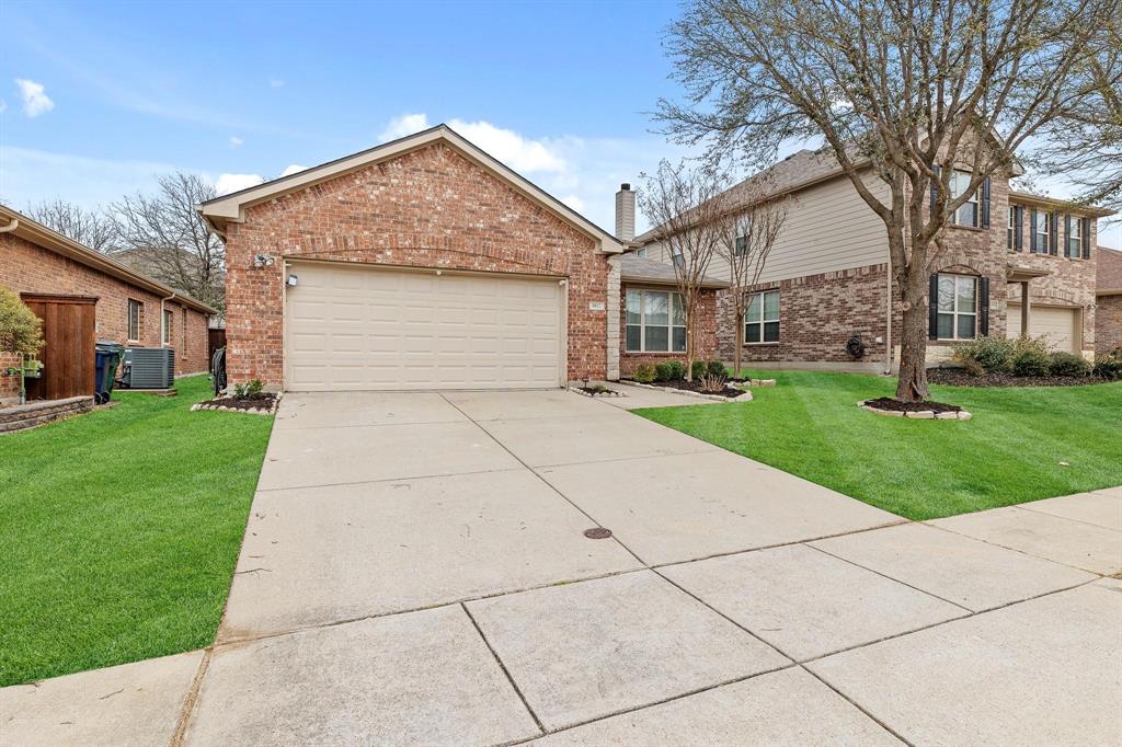 5812 Pebble Ridge Drive McKinney, TX 75070 - Photo 26 of 29 a front view of house with yard