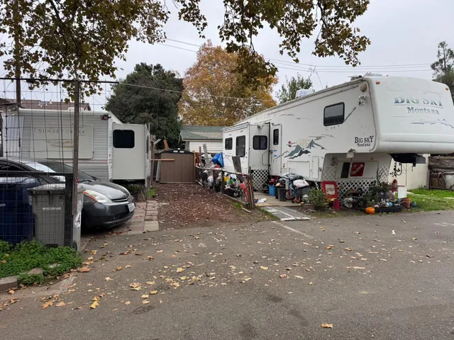 a view of a wooden door of the house