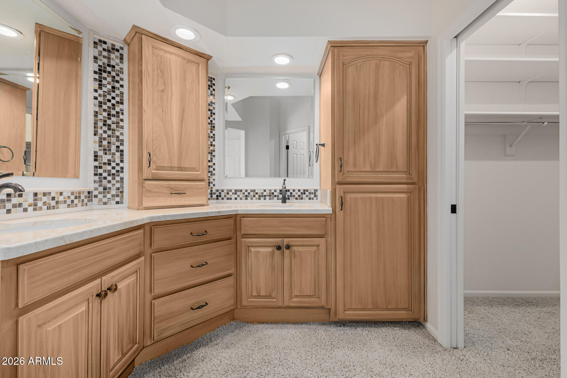 25615 North Bolero Bend, Unit 5 Rio Verde, AZ 85263 - Photo 26 of 57 a bathroom with a sink and a mirror