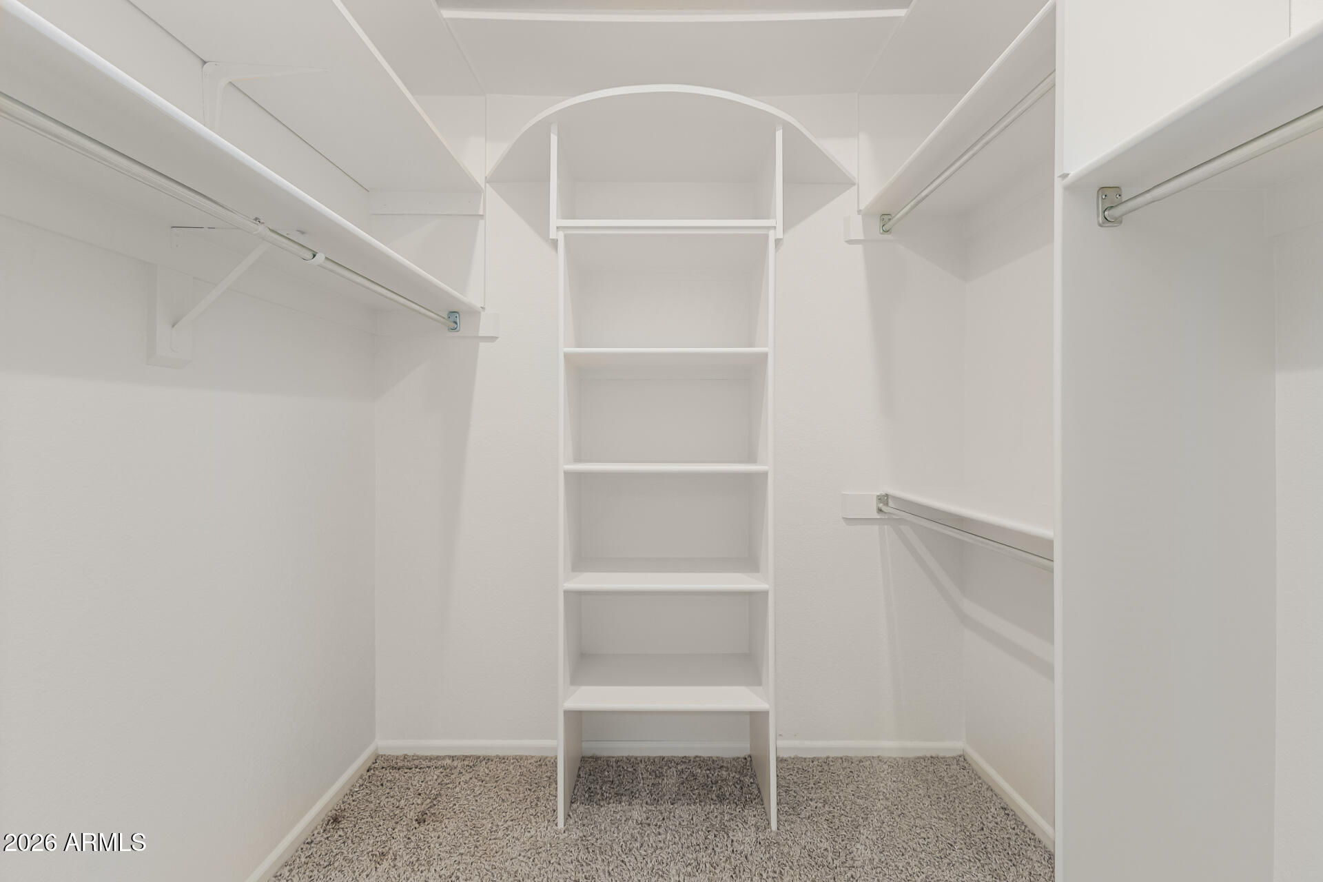 25615 North Bolero Bend, Unit 5 Rio Verde, AZ 85263 - Photo 27 of 57 a view of an empty walk in closet