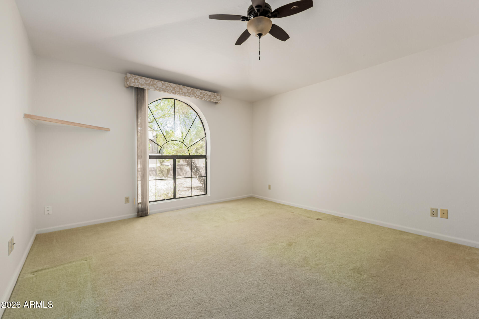 25615 North Bolero Bend, Unit 5 Rio Verde, AZ 85263 - Photo 28 of 57 an empty room with a window