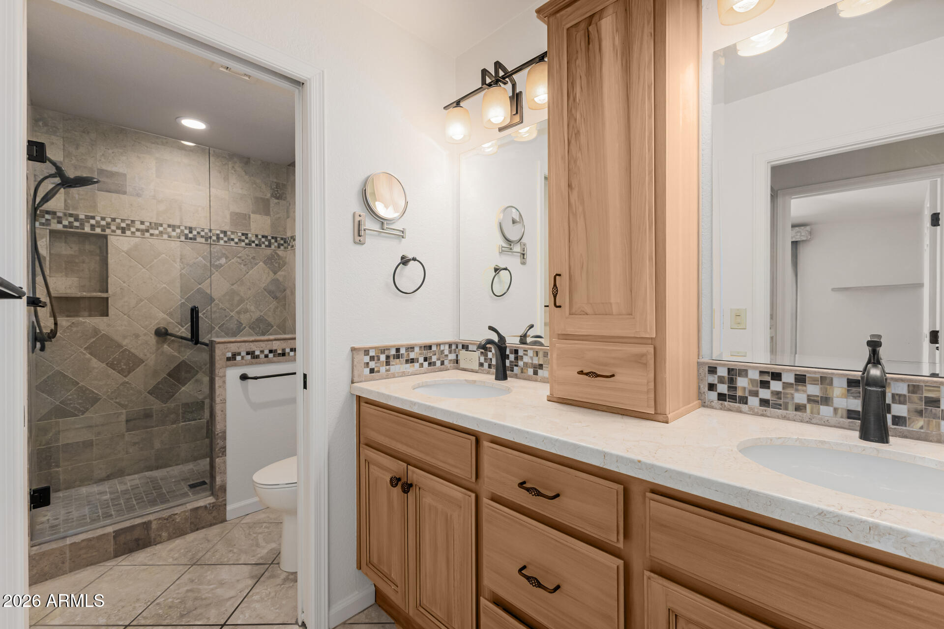 25615 North Bolero Bend, Unit 5 Rio Verde, AZ 85263 - Photo 31 of 57 a spacious bathroom with a shower sink and mirror