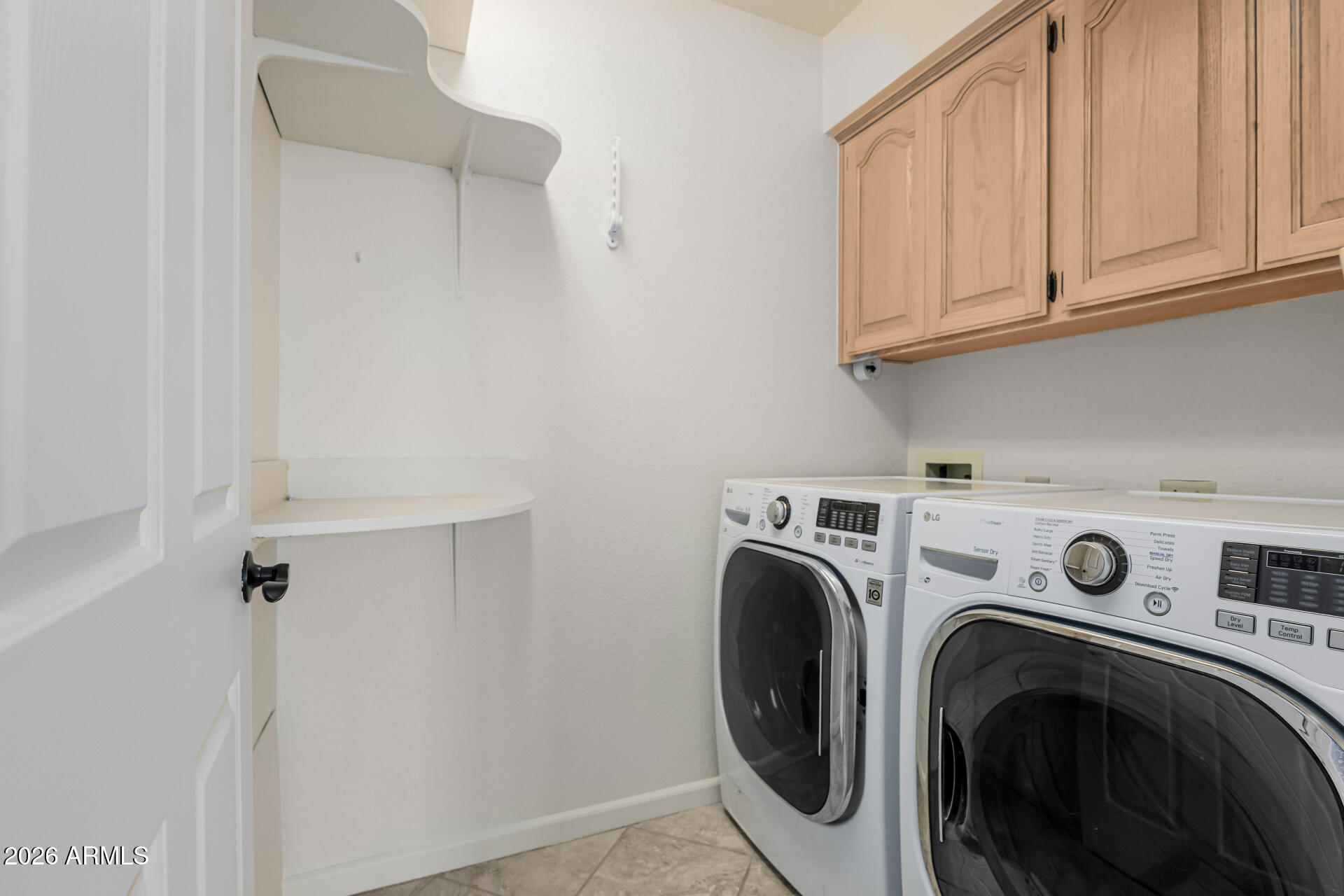 25615 North Bolero Bend, Unit 5 Rio Verde, AZ 85263 - Photo 33 of 57 a utility room with dryer and washer