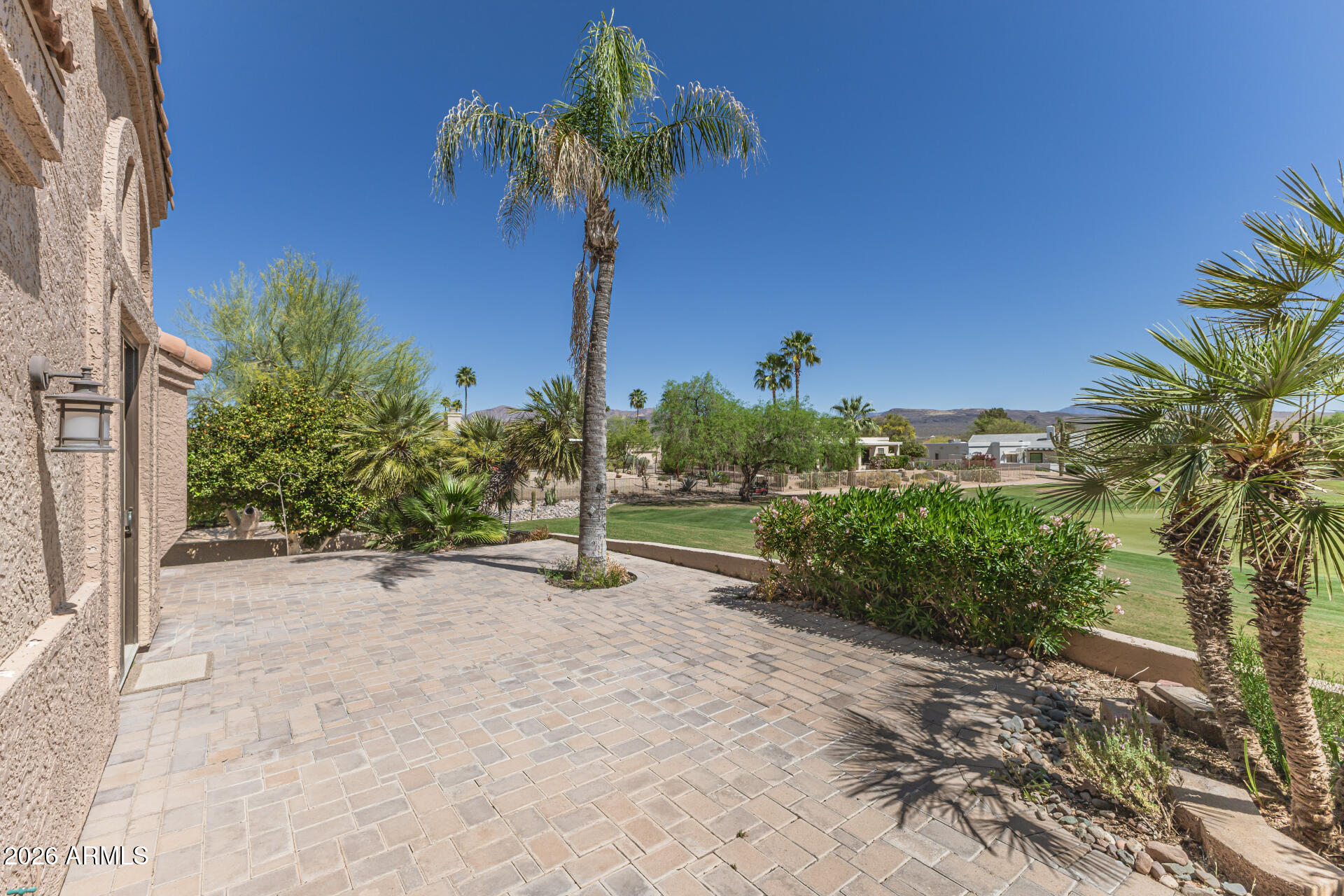 25615 North Bolero Bend, Unit 5 Rio Verde, AZ 85263 - Photo 35 of 57 a small garden covered with tall trees