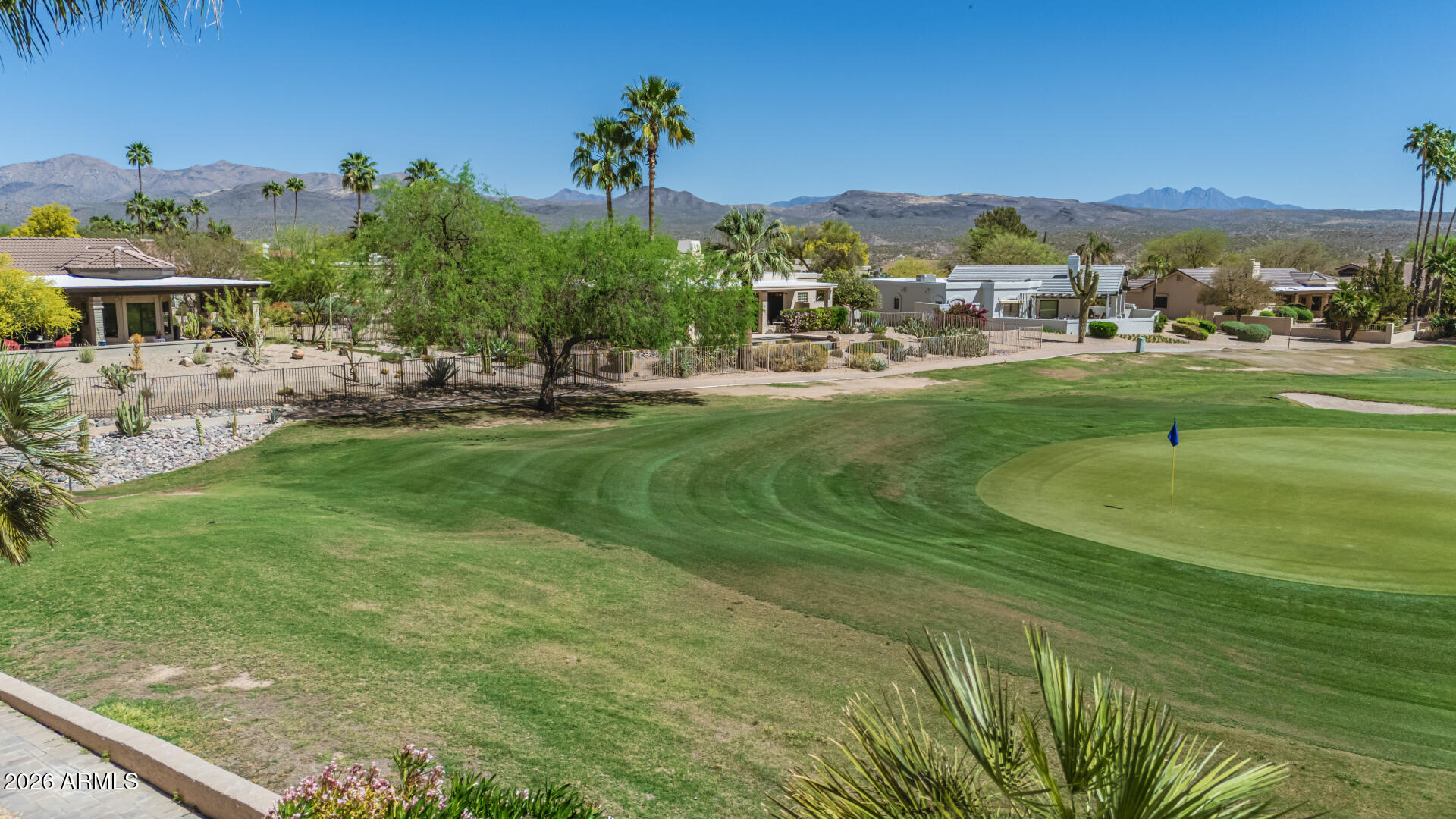 25615 North Bolero Bend, Unit 5 Rio Verde, AZ 85263 - Photo 40 of 57 a front view of a house with a garden