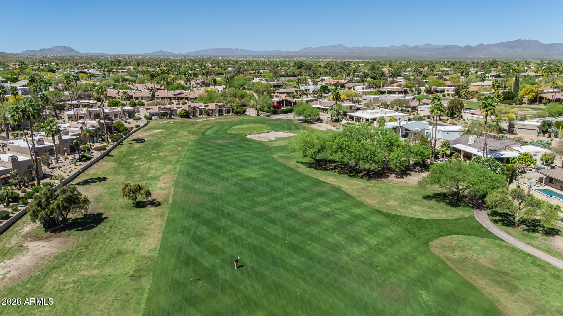 25615 North Bolero Bend, Unit 5 Rio Verde, AZ 85263 - Photo 41 of 57 a view of a city with mountains in the background